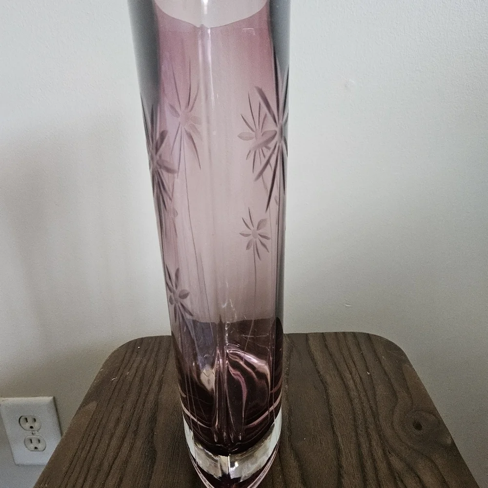 Elegant oval clear cut purple vase.
